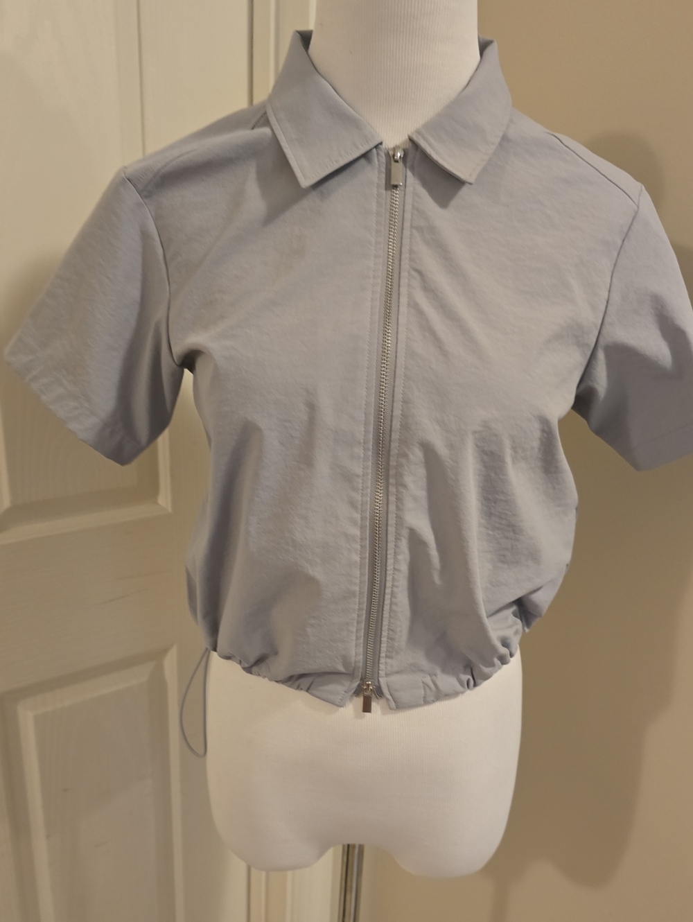 GU Small Light Gray Jacket with White Ribbed Trim